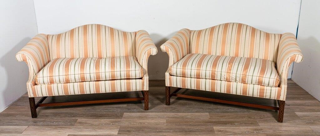 PAIR OF CHIPPENDALE STYLE SETTEES