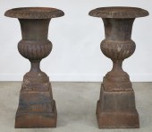 PAIR OF CLASSICAL CAST IRON ST
