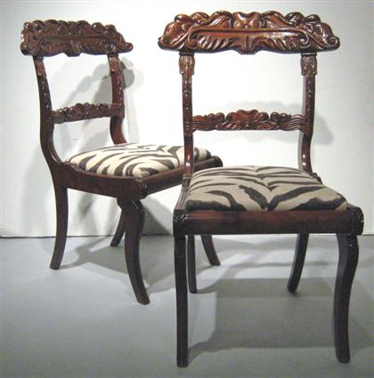 Pair of Colonial carved mahogany