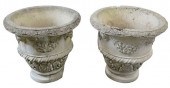 PAIR OF CONCRETE URNS WITH FAC