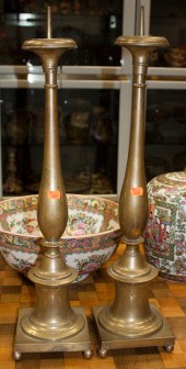 Pair of Continental brass pric
