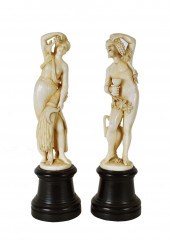 PAIR OF CONTINENTAL CARVED FIG