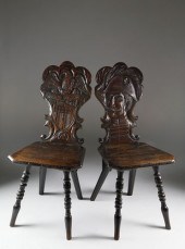 PAIR OF CONTINENTAL CARVED OAK