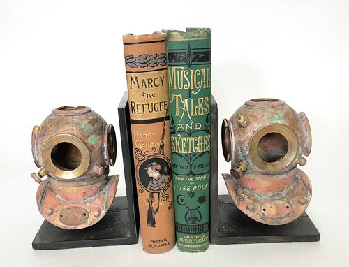 PAIR OF COPPER PATINA DIVER