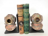PAIR OF COPPER PATINA DIVER HE