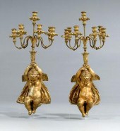 Pair of cupid shelf brackets: