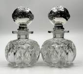 PAIR OF CUT GLASS COLOGNES BY