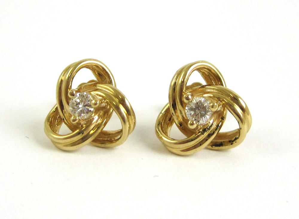 PAIR OF DIAMOND LOVE KNOT STUD