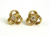 PAIR OF DIAMOND LOVE KNOT STUD