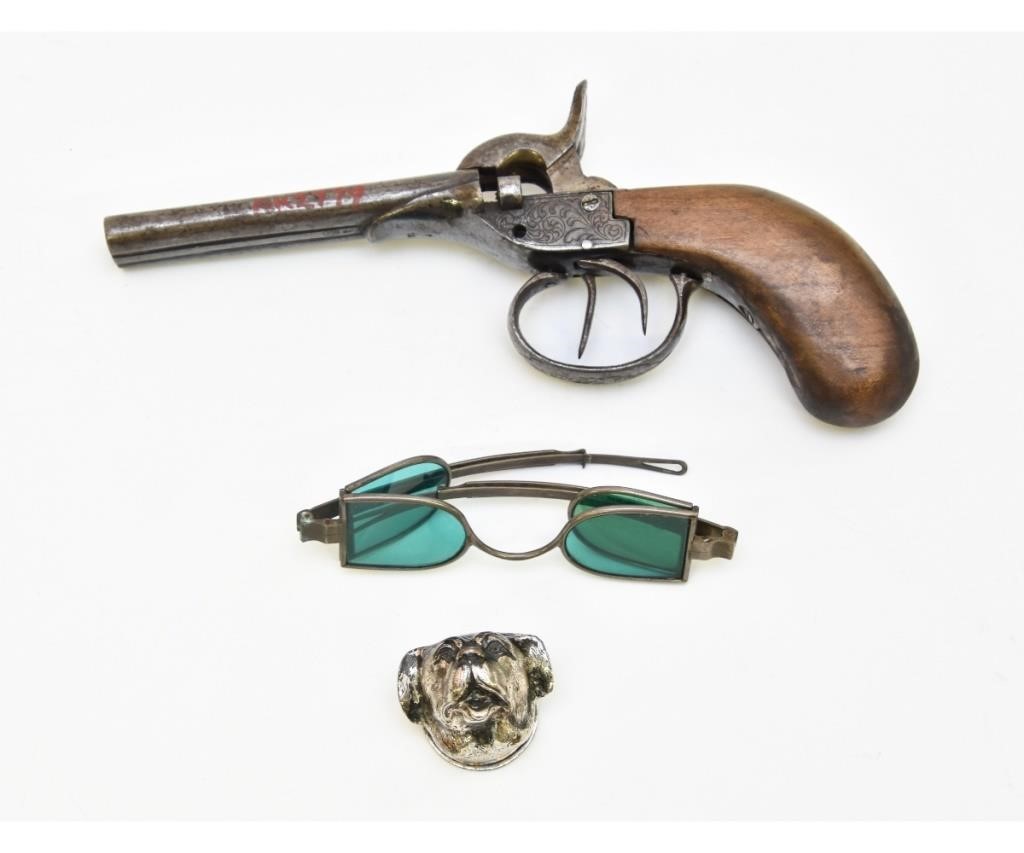 Pair of early green glass eye