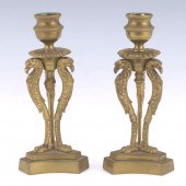 PAIR OF EMPIRE STYLE PATINATED