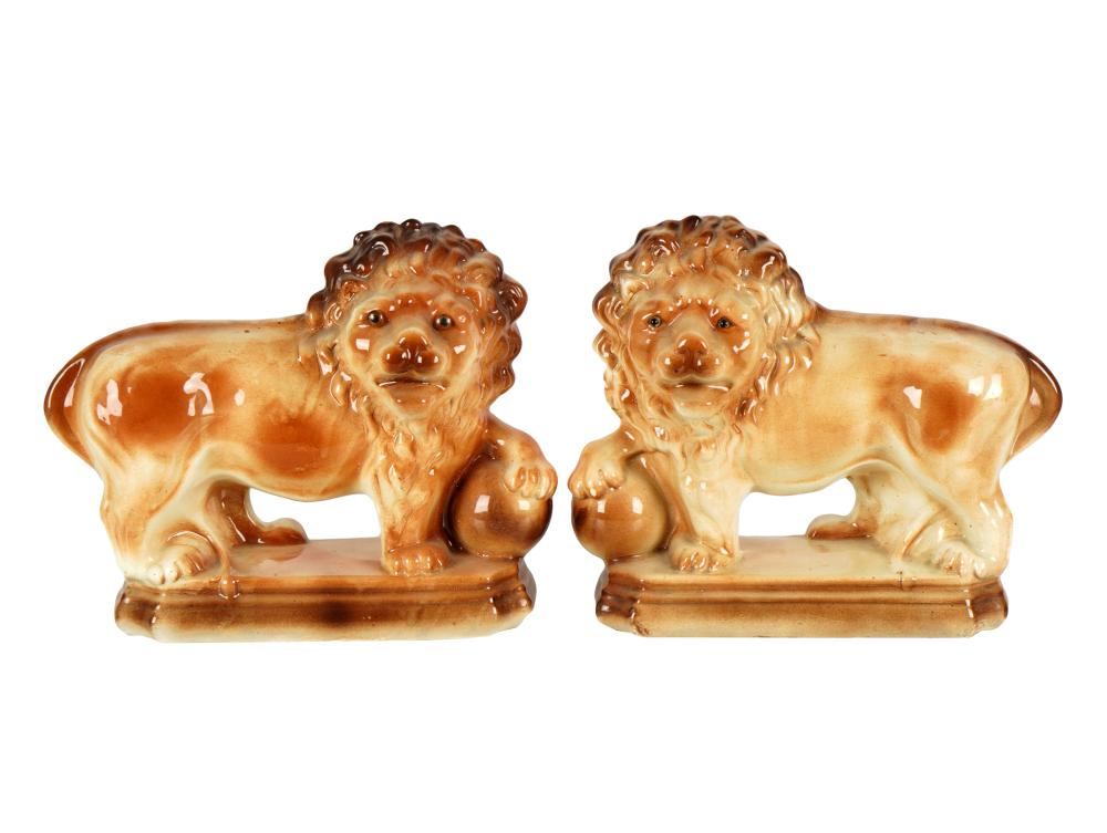 PAIR OF ENGLISH POTTERY LION