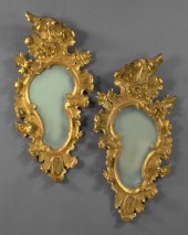 Pair of Exuberantly Modeled It
