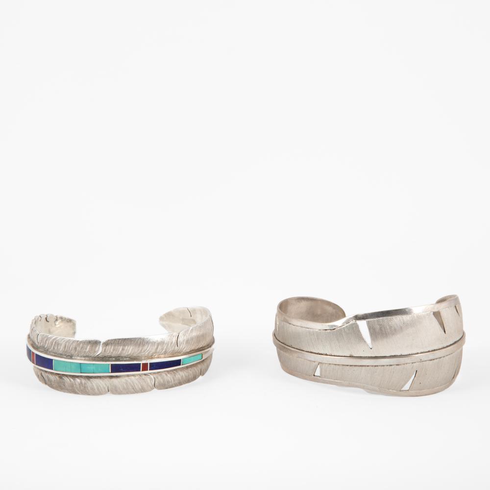 PAIR OF FEATHER CUFFS BY MICHAEL