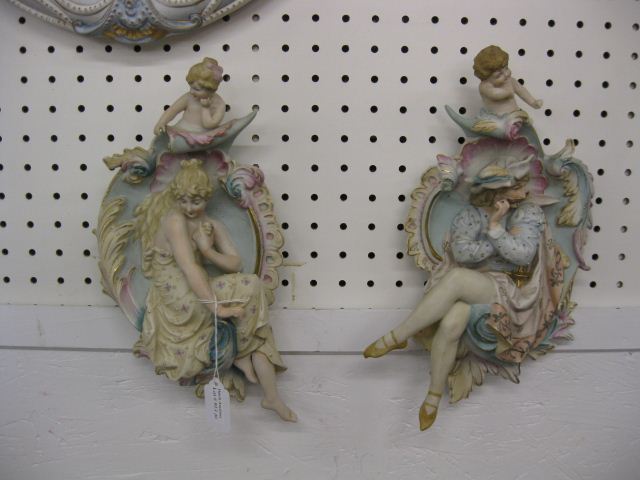Pair of Figural Bisque Plaques