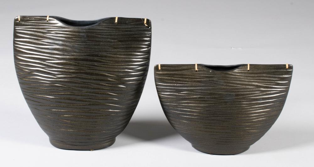 PAIR OF FLATTENED BLACK CERAMIC