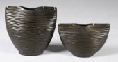 PAIR OF FLATTENED BLACK CERAMI