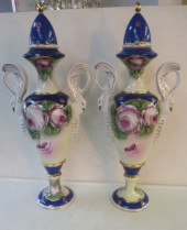 PAIR OF FLORAL URNS WITH SWAN