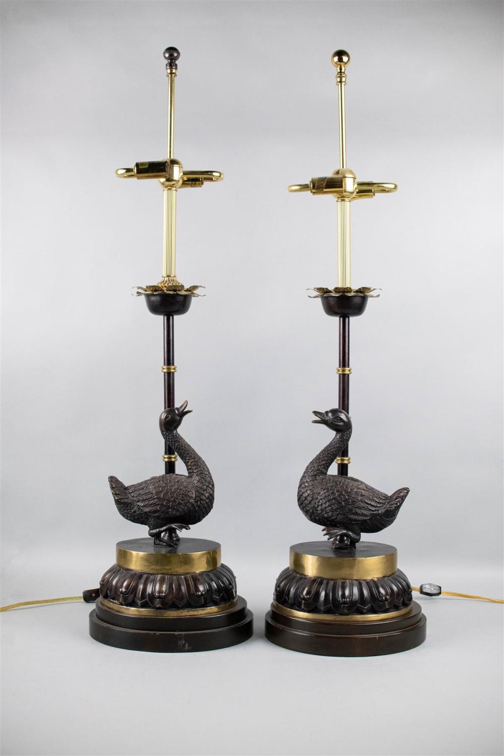 PAIR OF FREDERICK COOPER BRASS