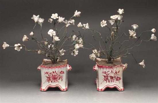 Pair of French faience diminutive