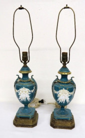 PAIR OF FRENCH PORCELAIN CHERU