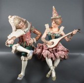 Pair of German majolica seated