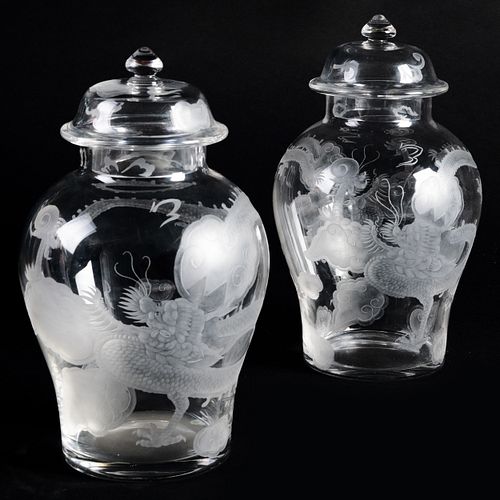 PAIR OF GLASS JARS AND COVERS