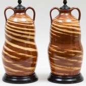 PAIR OF GLAZED EARTHENWARE SLI