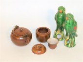 Pair of green glazed parrot mo