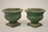PAIR OF GREEN PAINTED CEMENT G