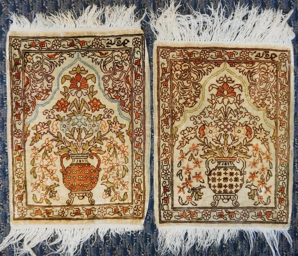 PAIR OF HEREKE SILK MATS, 1 FT 2 IN