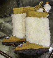 PAIR OF HIDE MOCCASIN BOOTS WI