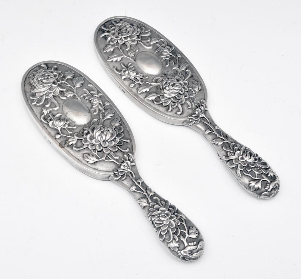 PAIR OF HUNG CHONG REPOUSSE