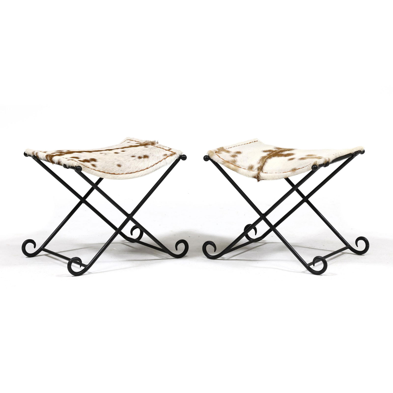 PAIR OF IRON AND COWHIDE CURULE