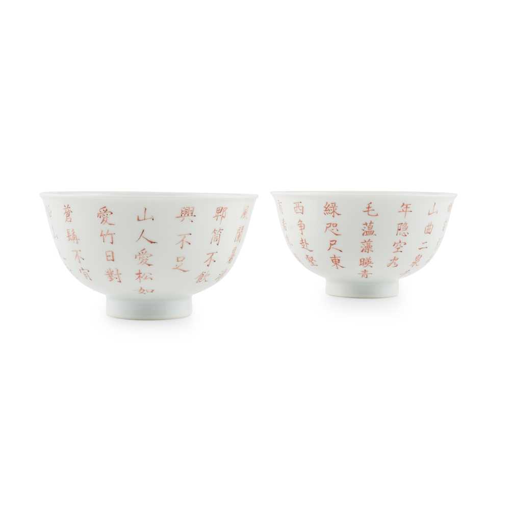 PAIR OF IRON-RED 'INSCRIBED'
