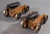 PAIR OF IRON SIGNAL SALUTE CAN