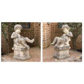 PAIR OF ITALIANATE CARVED STON