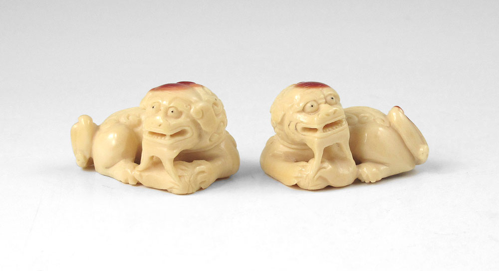 PAIR OF IVORY FOO LION NETSUKES: