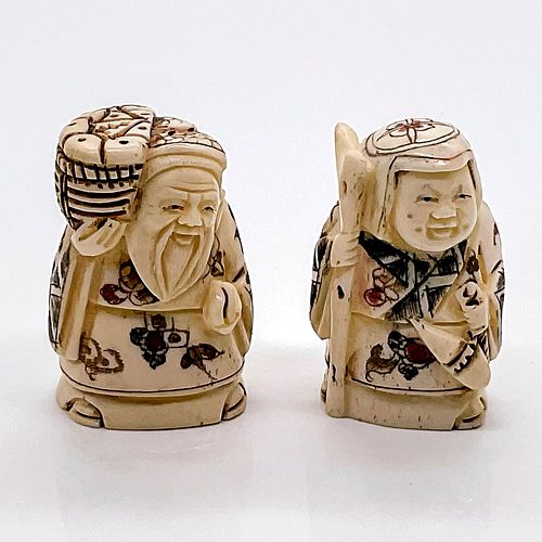 PAIR OF JAPANESE INKED CARVED