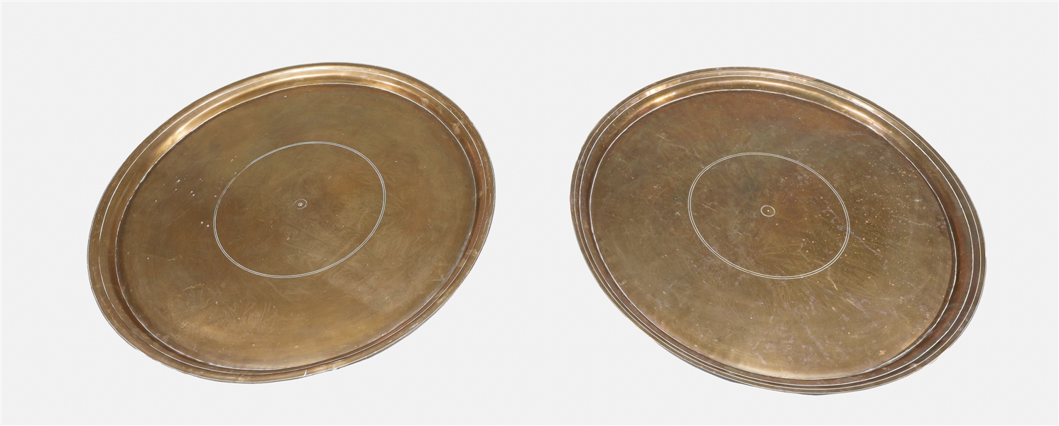 Pair of large brass charger