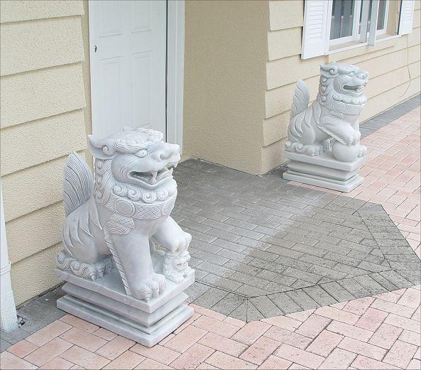 PAIR OF LARGE CARVED MARBLE FOO