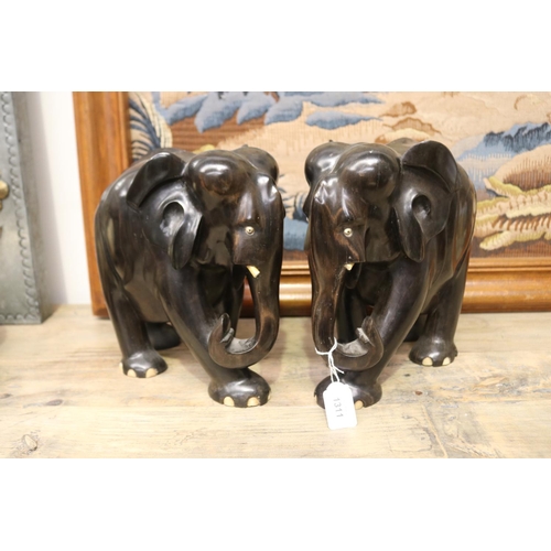 Pair of large Ebony elephants,