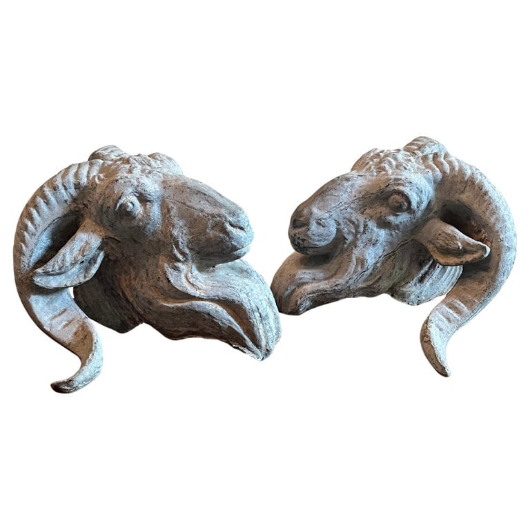 PAIR OF LEAD ARCHITECTURAL RAM'S