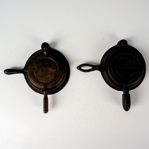 PAIR OF MINI CAST IRON GERMAN