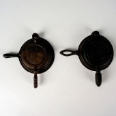 PAIR OF MINI CAST IRON GERMAN