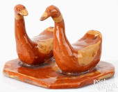 PAIR OF MODELED REDWARE GEESE