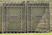 PAIR OF MONUMENTAL CAST IRON E