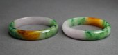 PAIR OF MOTTLED JADE BANGLE BR