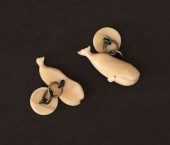 PAIR OF NANCY CHASE CARVED RIG