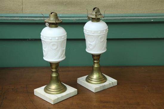 PAIR OF OIL LAMPS. Milk glass fonts